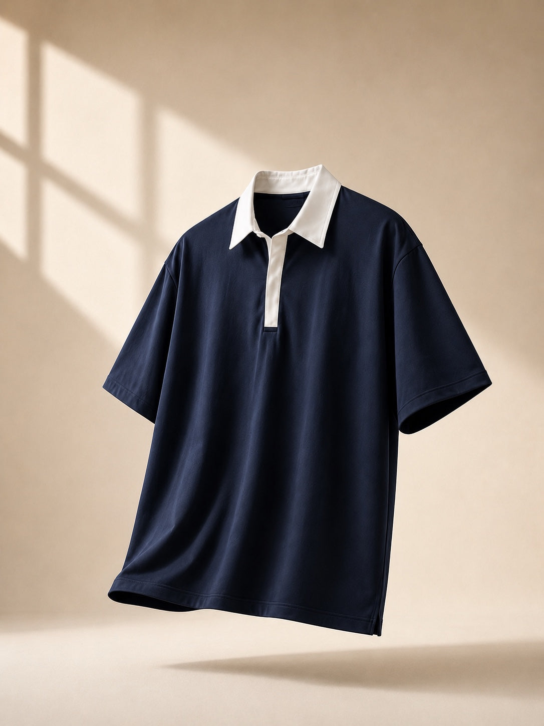 Swaguer lacivert ekru kontrast yaka oversize polo t-shirt ön açılı ürün görseli