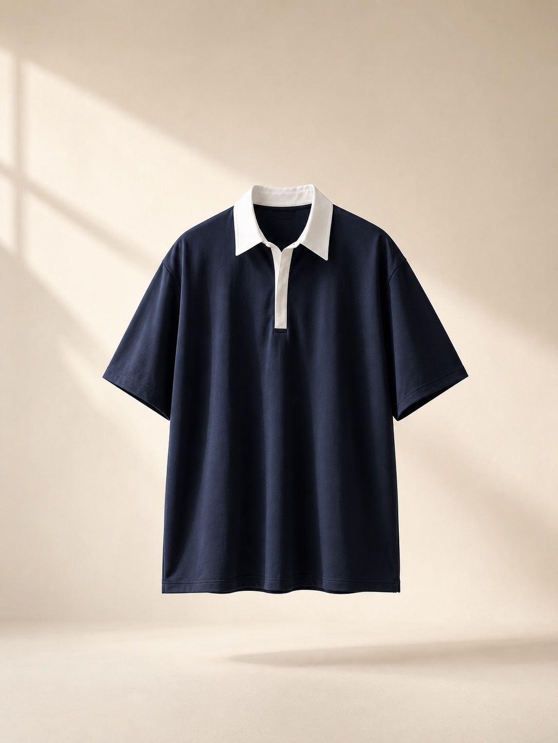 Swaguer lacivert ekru kontrast yaka oversize polo t-shirt ön açılı ürün görseli